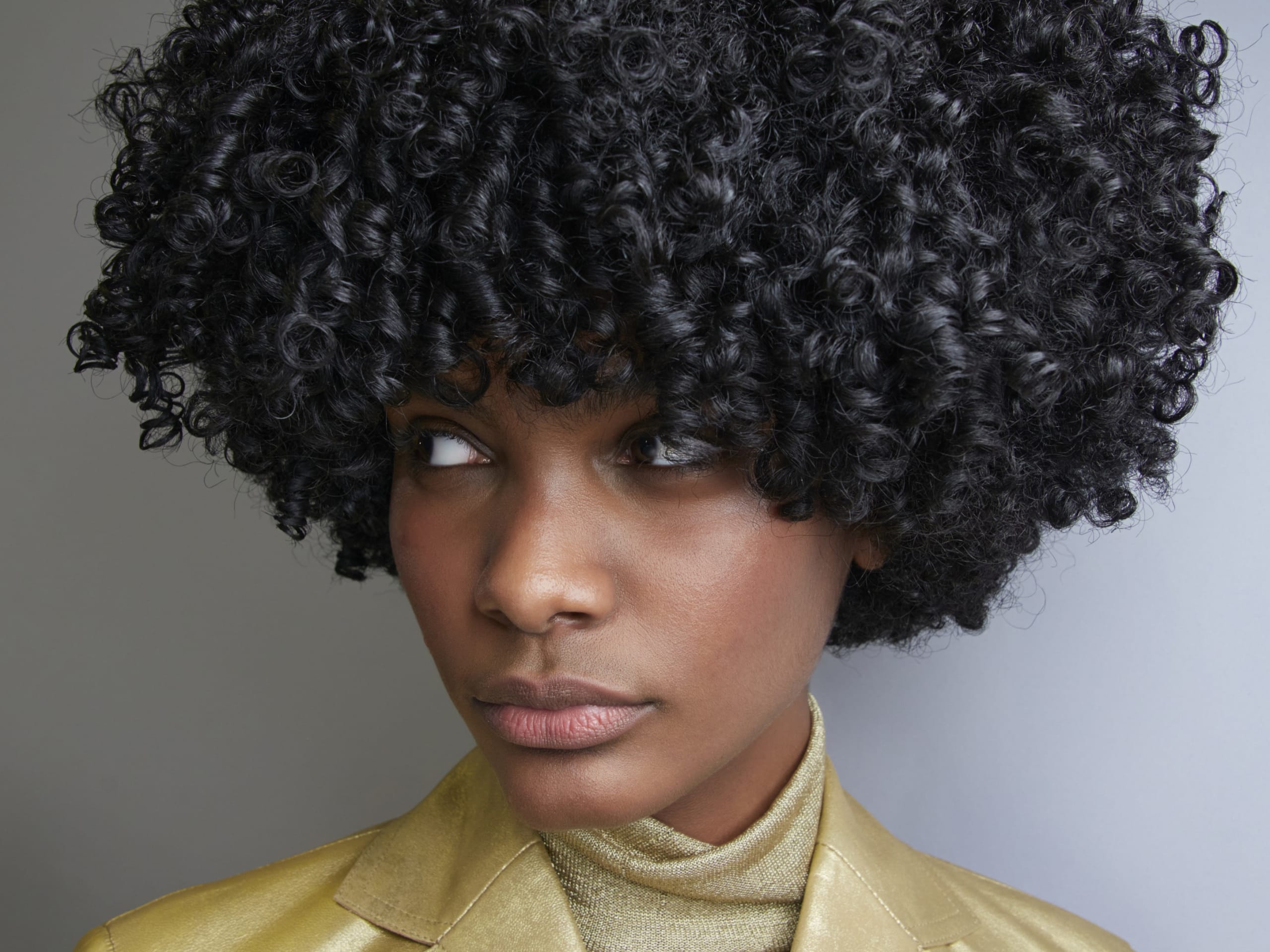 Curly hair video variant showing curl definition messaging